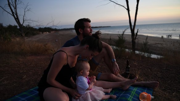 Bethan and Johhny McElwee watch the sun set at Dripstone Cliffs in Darwin on Aviana's first birthday. 
