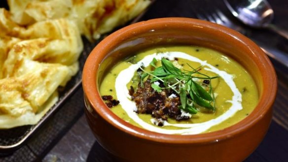 Ammas red lentil dhal served with flaky paratha.