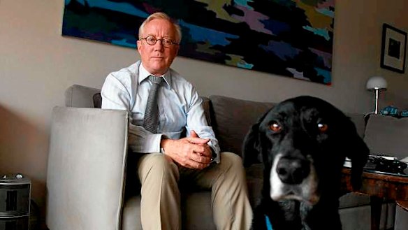 Expelled magistrate Peter Law and his dog Murray at his home in Coogee, Sydney. Photo: Ben Rushton