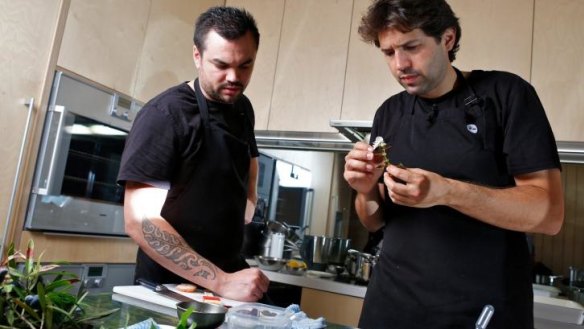 Peter Gunn (left) working with Attica's Ben Shewry in the Ripponlea restaurant's test kitchen in 2014.