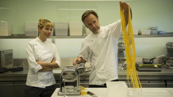 It's a stretch: Marcus Wareing and Sienna Miller in the kitchen training for the film Burnt. 