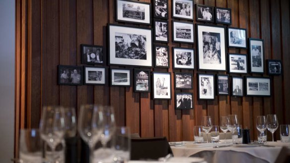 Family business ... Gambaro history lines the wall at Cut Steakhouse and Tapas.