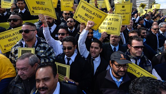 Taxi drivers protesting at Parliament House in September 2015 over the Uber X App that they say is destroying their business.