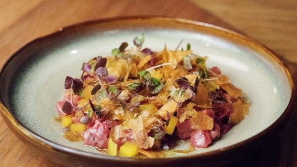 Beef tartare with pickled eggplant.