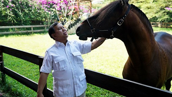 Prabowo Subianto with his horse. 