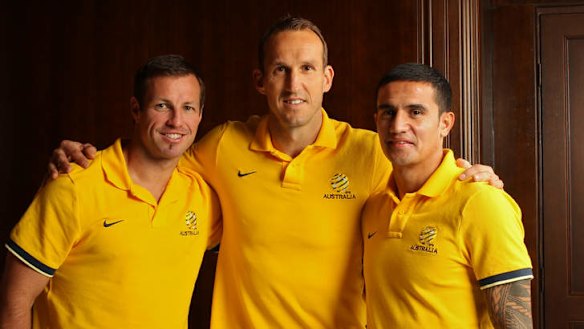 In reach of their goal: Lucas Neill, Mark Schwarzer and Tim Cahill.
