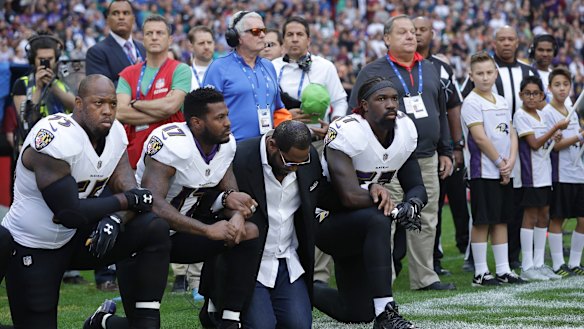 Members of the Baltimore Ravens take a knee on Sunday at Wembley, London.