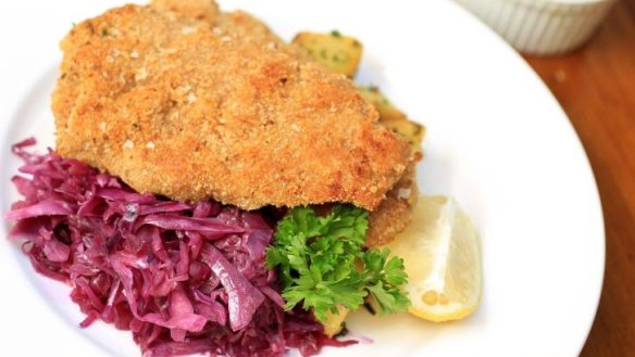 Veal schnitzel with braised cabbage.