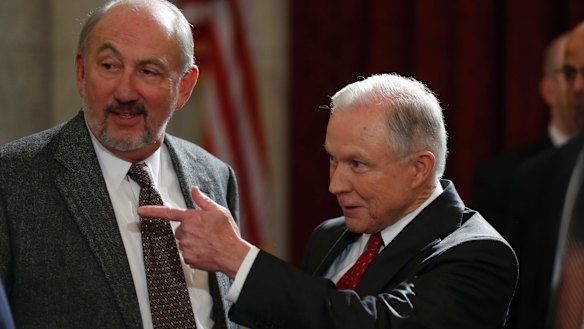 Jeff Sessions gestures during a break in testimony on Capitol Hill in Washington, DC.