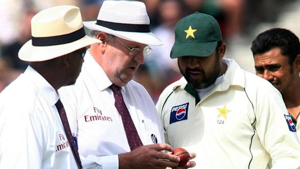 Chequered history: Umpires Billy Doctrove and Darrell Hair examine the match ball with Pakistan captain Inzamam-ul-Haq during the fourth Test at the Oval in 2006. Pakistan forfeited the match to England in protest against allegations over ball tampering.