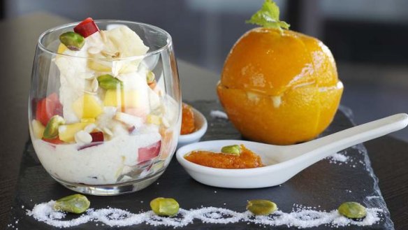 Desserts: Paysam, carrot halva and an orange filled with sweet kulfi.