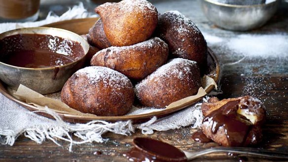 The perfect date night treat. Orange and ricotta doughnuts and chocolate dipping sauce.