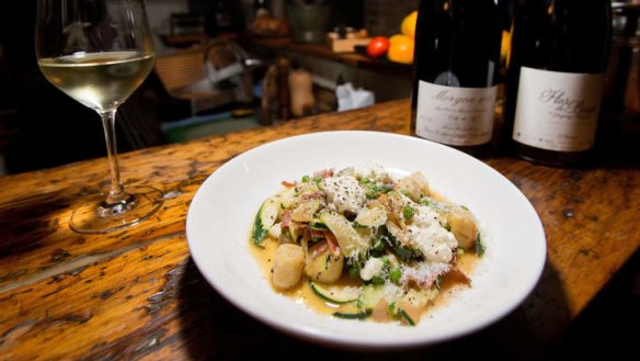 Gnocchi with baby peas, pancetta and zucchini.