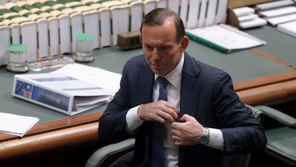 Prime Minister Tony Abbott packs up after question time on Tuesday. Photo: Andrew Meares