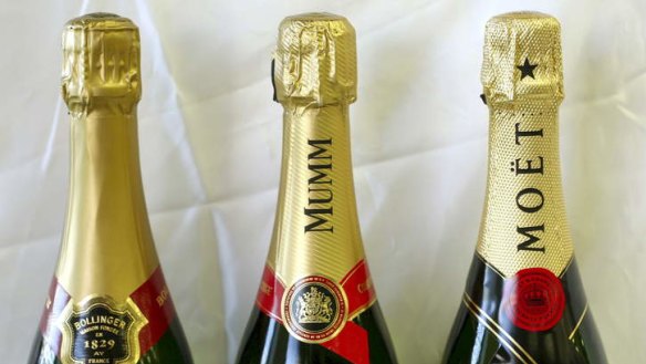 Champagne houses, from left, Bollinger, GH Mumm and Moet.