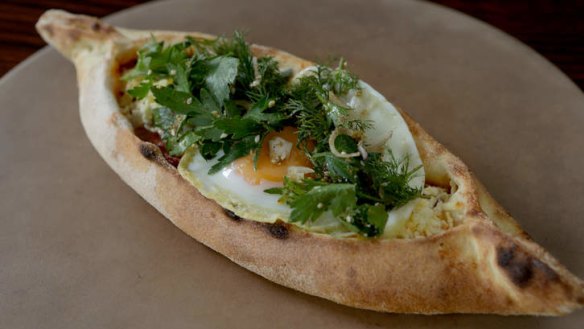 Flatbread with chorizo, haloumi and a fried egg.