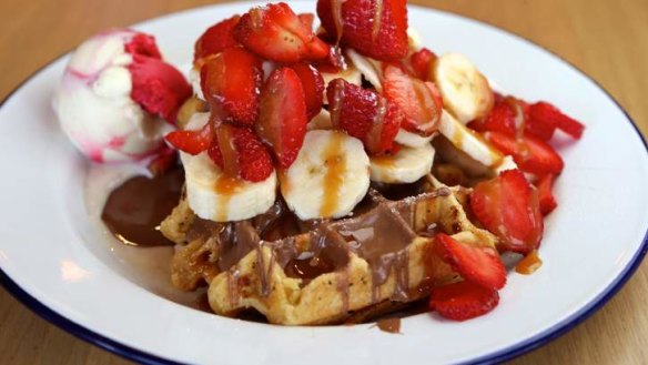 Waffles with strawberries, banana and Belgian couverture chocolate.