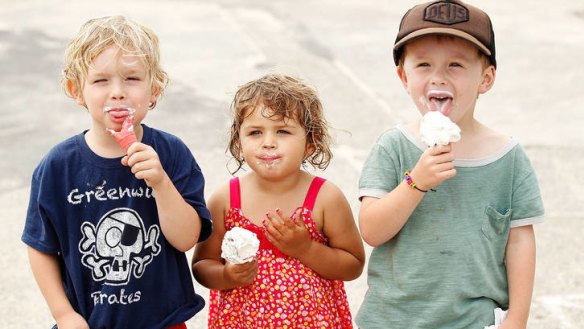 Children pose with ice cream.