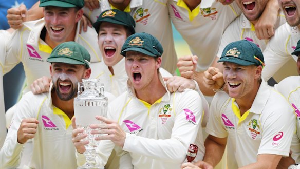 Too good: The Australian team celebrate after their 4-0 win in the Ashes.