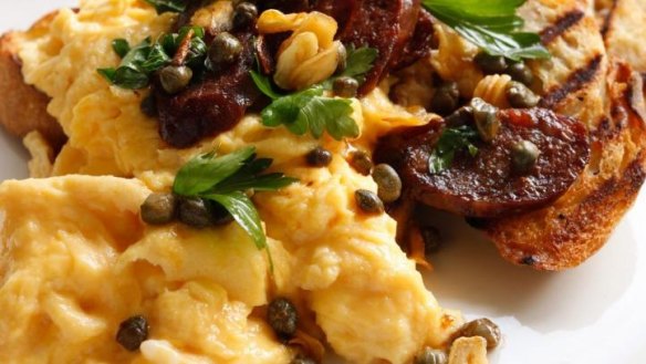 Scrambled eggs with chorizo and fried garlic. 