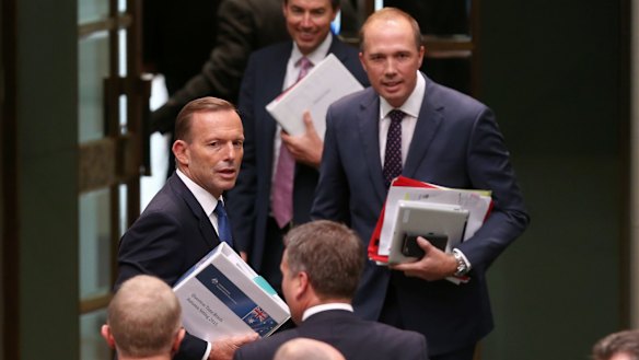 Prime Minister Tony Abbott and Immigration Minister Peter Dutton leave question time on Tuesday.