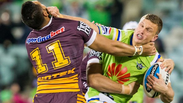 Jack Wighton tries to fend off Brisbane's Alex Glenn.