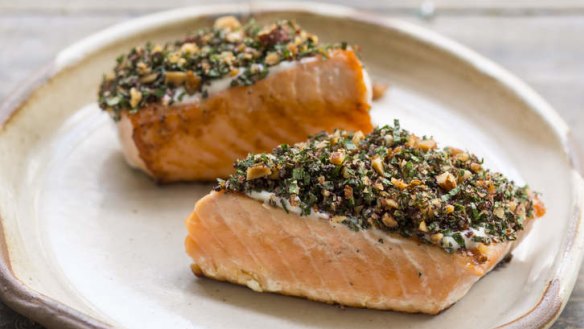 Vibrant barbecued salmon with tahini and herbs.