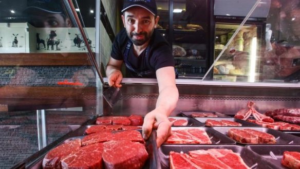 T-bone to takeaway: Bondi's Peter Zaidan cooks steak to order.