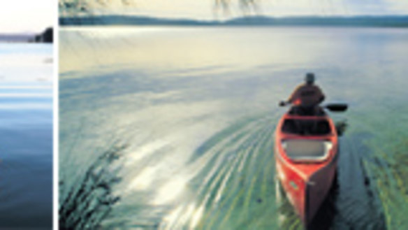 Barely a ripple ... (from far left) a houseboat is an ideal way to explore Myall Lakes National Park; a lone pelican on Myall Lake; kayaking on Two Mile Lake.