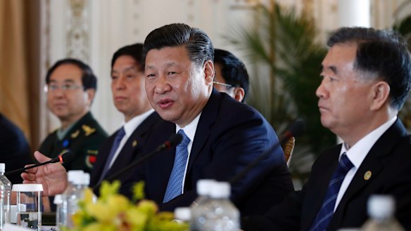 Chinese President Xi Jinping, joined by Chinese Vice Premier Wang Yang, right, speaks during a bilateral meeting with President Donald Trump.