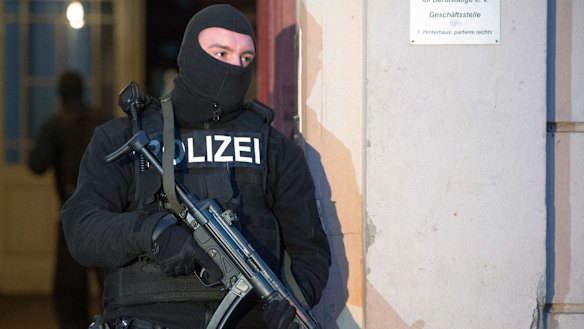 Belgium uncovers plot to kill police as anti-terrorism raids sweep Europe