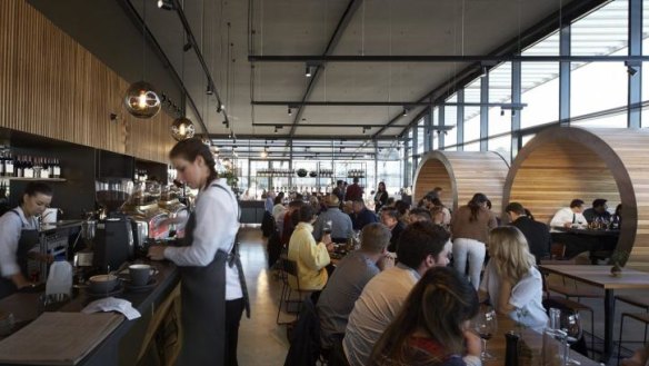 Ezard @ Levantine Hill features barrel-shaped booths. 