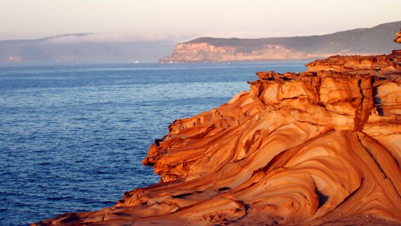 Educational escape ... sandstone swirls in Bouddi National Park.