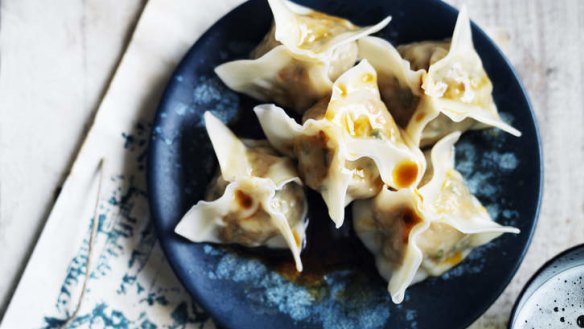 Prawn wontons with chilli oil and soy sauce.