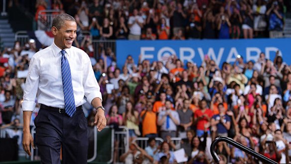 US President Barack Obama arrives for a campaign rally at the University of Miami in Florida.