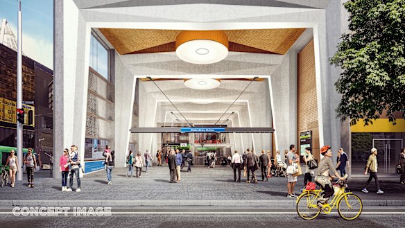 A view of the State Library station entrance from Swanston Street.