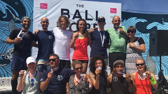 The runners celebrate their efforts,