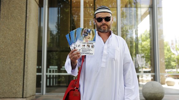 Nick Folkes leaves court dressed in mock Islamic outfit after appealing against a Federal Court injunction to stop the commemorations of the 2005 Cronulla race riots.