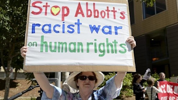 Members of the Refugee Action Collective hold a vigil for Hamid Kehazaei outside the Mater Hospital.