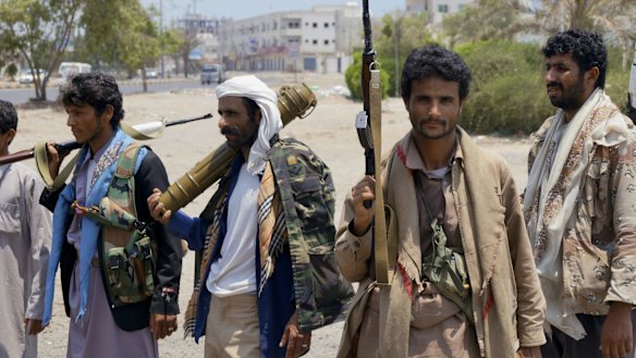 Houthi fighters gather at a street in Aden, Yemen. The Shiite rebels and their allies fought their way through the commercial centre of Aden on April 2.