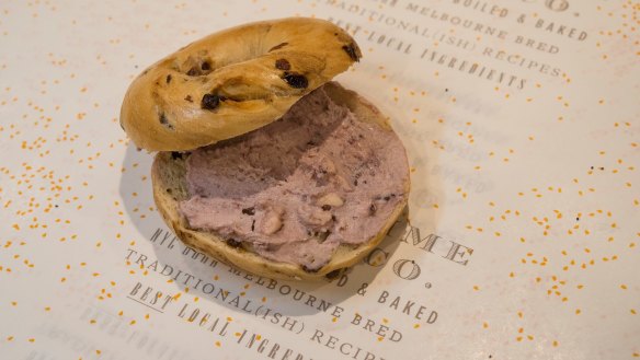 Blackberry cream cheese on a cinnamon and blueberry bagel at Five &amp; Dime.