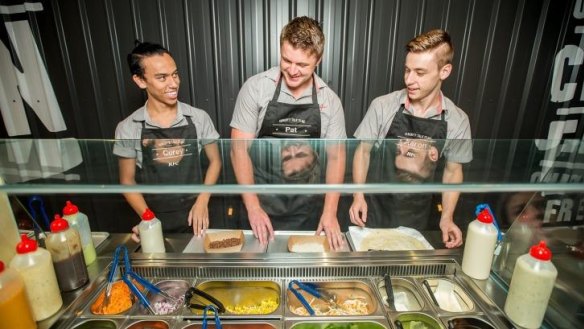 Burger, wrap, or bowl? Staff at KFC's concept store. 