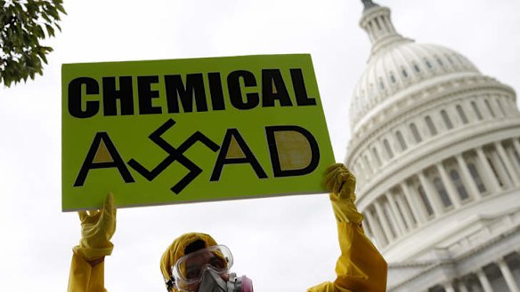 Abdullah Ibraheen joins Syrian American protesters outside the US Capitol on Monday to urge Congress to support  President Barack Obama in striking Syria for using chemical weapons against its own people.