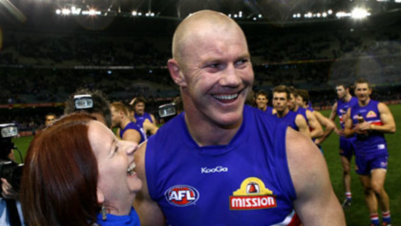 Favourite player ... Julia Gillard with Barry Hall after the Bulldogs thumped North Melbourne yesterday.