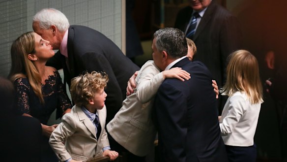 Treasurer Joe Hockey with his children Ignatius, Xavier and Adelaide Hockey after handing down the budget on Tuesday.