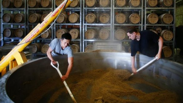 Handmade: Jonathan Liu and Dave Withers at work at Archie Rose Distilling Co.