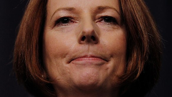 Historic day ... for Julia Gillard, who lost popularity after vowing before the election there would be no carbon tax under her government.