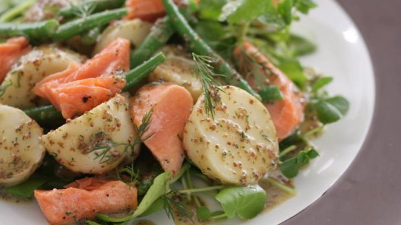 Salmon, potato and dill salad. Jill Dupleix Warm Autumn Salads recipes for Epicure. Photographed by Marina Oliphant. Food preparation and styling by Caroline Velik, plate and table runner from Safari Living, MUST CREDIT WITH EVERY USE.