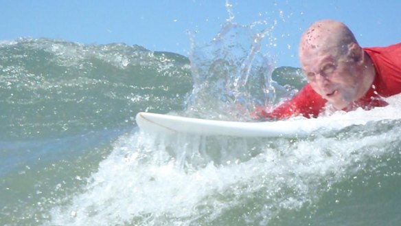 Matt Golinski enjoying the surf on the Sunshine Coast earlier this month.