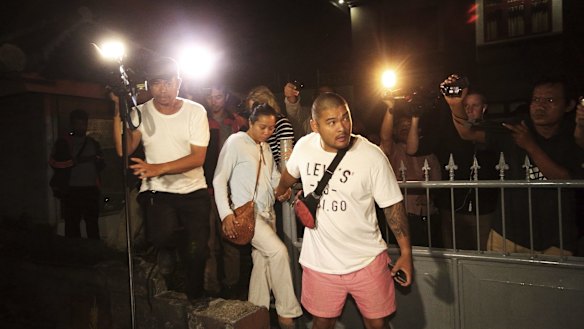 Michael Chan (right) with his girlfriend Phoebe leaves Kerobakan Prison after attempting to see his brother Andrew Chan prior to his transfer from Bali, Indonesia. 
